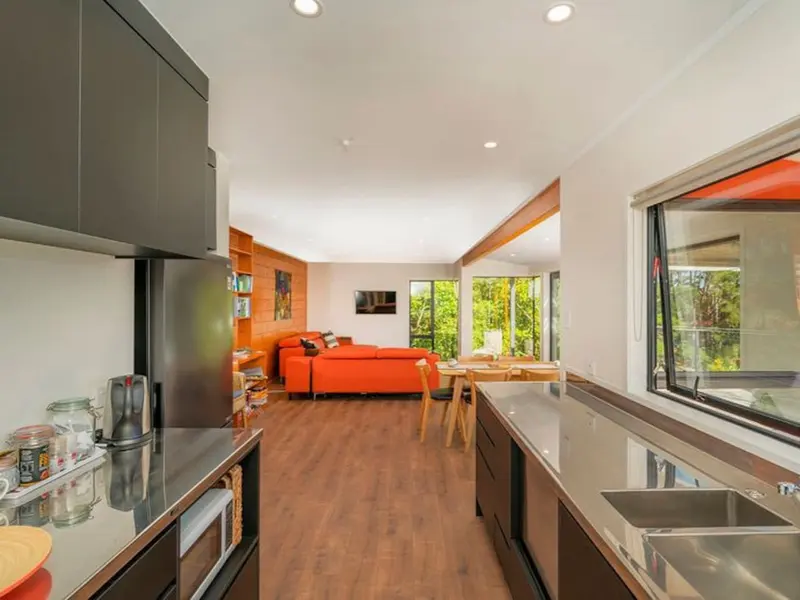 Galley kitchen leading through to the lounge